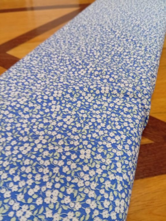 Algodón azul con flores